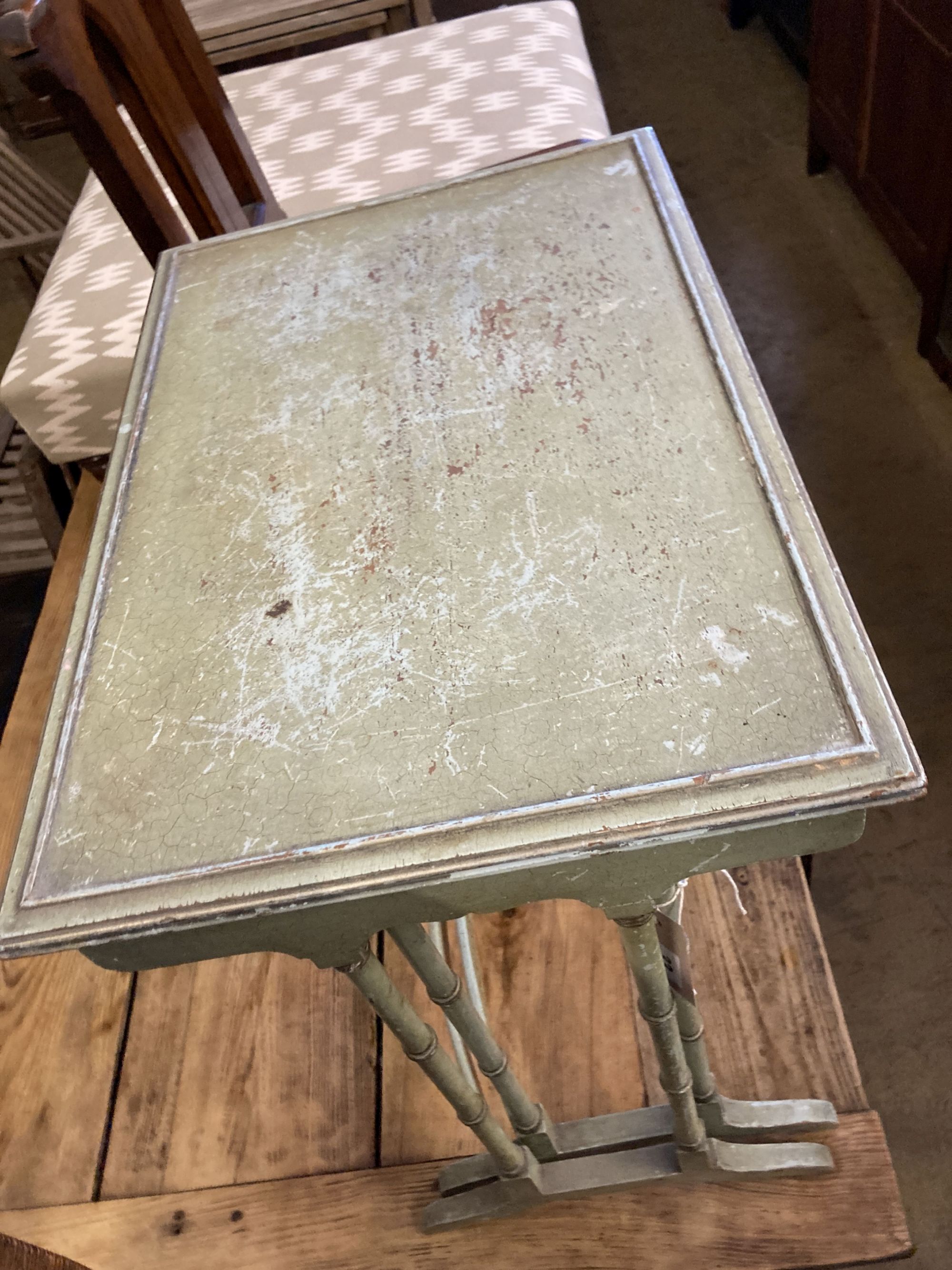 A nest of two painted rectangular tea tables and a Victorian Gothic style walnut hall chair